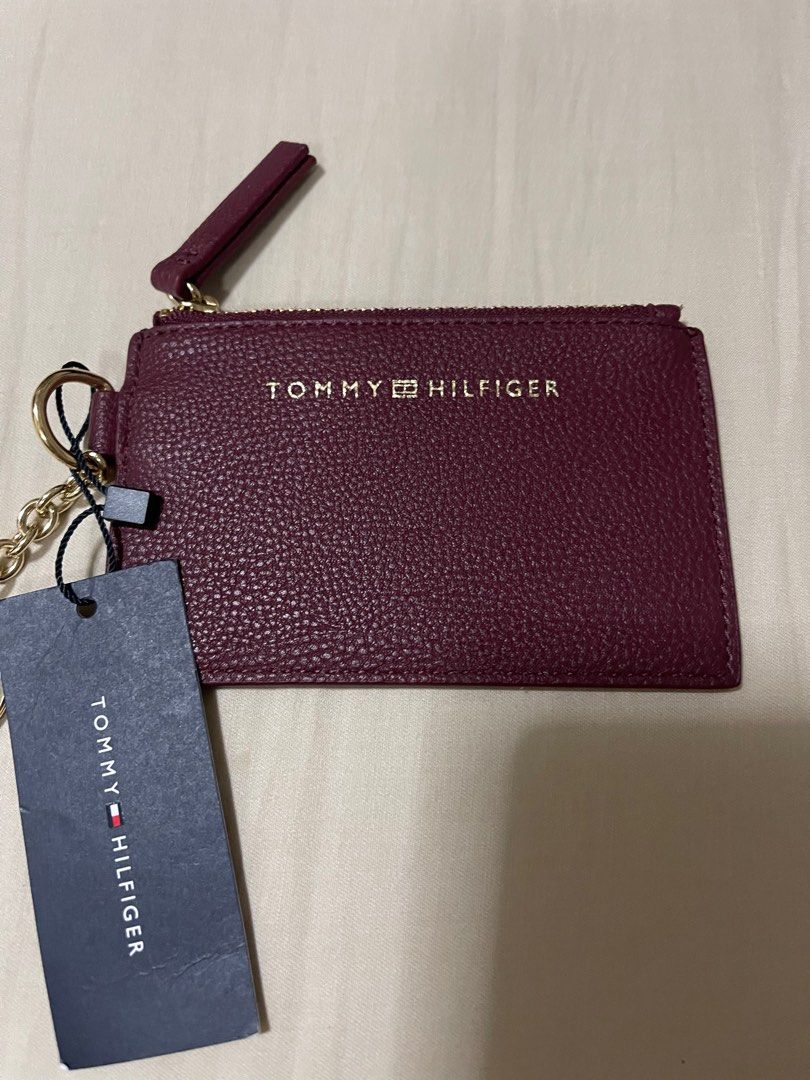 Tommy Hilfiger card holder (Category: Wallets & Card holders) located in Manila. Submitted by declutterfindss (Listing ID 1304994096, Image 1). Description: Pls read details Authentic Brand new with tag Last price already will not reply to low ballers SF c/o buyer MOP Gcash, Bpi .