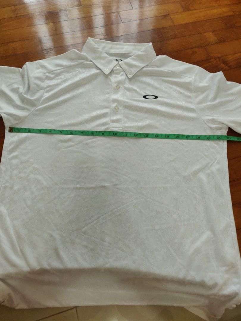 Oakley golf polo sale shop