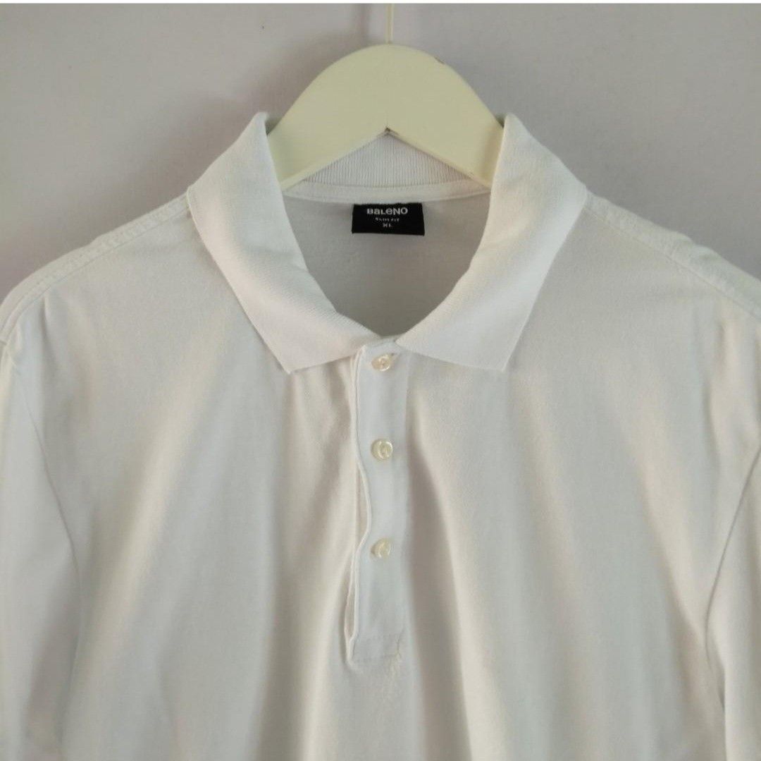 Baleno Plain White Collar Polo Shirt (Category: Tshirts & Polo Shirts ) located in Paranaque City. Submitted by trishabl_ (Listing ID 1305149695, Image 3). Description: Condition: 10/10 Description: - Thick fabric - Round neck - Short sleeves Color: White / Off White Size: XL 💵 MOP: BDO, Maya or GCash 🚚 MOD: Lalamove, Grab Express, Flash Express, LBC or J&T 📌 Location: Parañaque City 🏷 10% off if you buy 2 or more items.