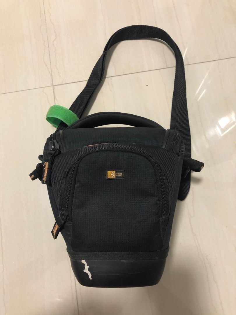 Case Logic - DSLR Camera Bag (Category: Camera Bags & Carriers) located in Manila. Submitted by summerkissmnl (Listing ID 1305266017, Image 1). Description: Hard Case Bag - With minimal flaws. (Chipped off black thingy at the bottom) other than that the bag is still in good condition. It doesn’t affect the purpose of the bag. It can till protect your camera from breaking. 🙂 Qc pick up. .