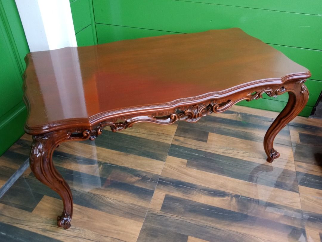 French Walnut Wooden Coffee Center Table (Category: Tables & Sets) located in Dasmarinas. Submitted by jamricana137 (Listing ID 1305168490, Image 3). Description: French Walnut Wooden Coffee Center Table in the Style of Louis XV. This table was delicately carved, and is raised on four carved cabriole legs. Completely restored, very sturdy and in great condition. Dimensions: L98 x W49 x H49cm.