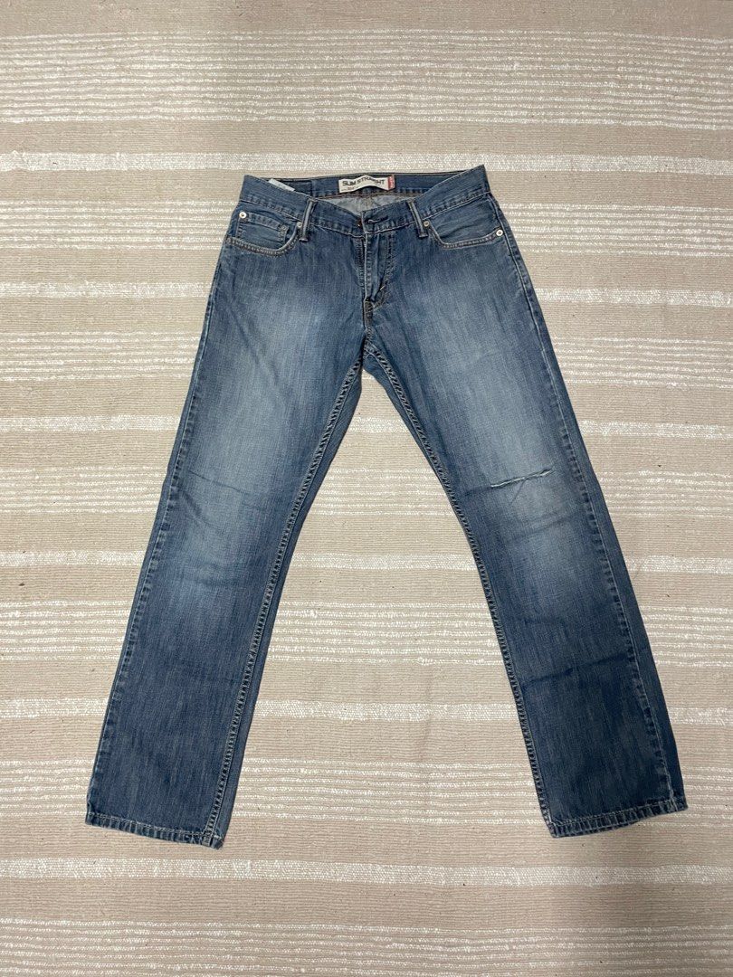 Levi 514 ripped jeans store