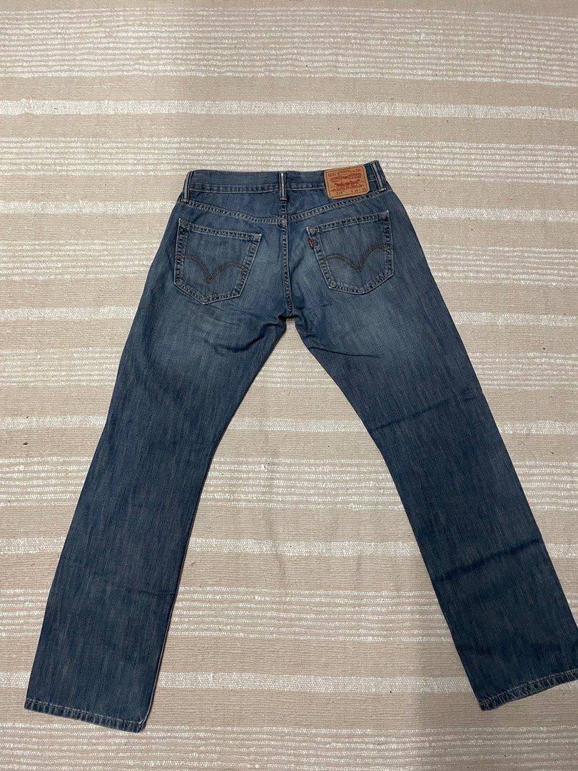 Levi 514 ripped jeans deals