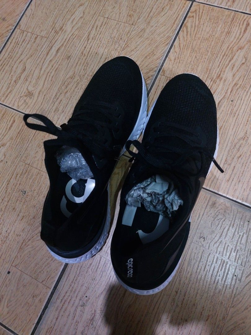 Nike Epic React Flyknit 2 Black White Running Shoes(29 cm) (Category: Sneakers) located in Baguio. Submitted by brand_master (Listing ID 1305305723, Image 2). Description: Authentic Nike Epic React Flyknit 2 Black White Running Shoes Size 11 US/29 cm/45 Europe Slightly used Thick outsole No box In excellent condition.