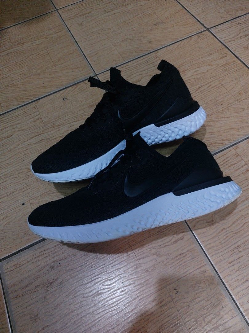Nike Epic React Flyknit 2 Black White Running Shoes(29 cm) (Category: Sneakers) located in Baguio. Submitted by brand_master (Listing ID 1305305723, Image 3). Description: Authentic Nike Epic React Flyknit 2 Black White Running Shoes Size 11 US/29 cm/45 Europe Slightly used Thick outsole No box In excellent condition.