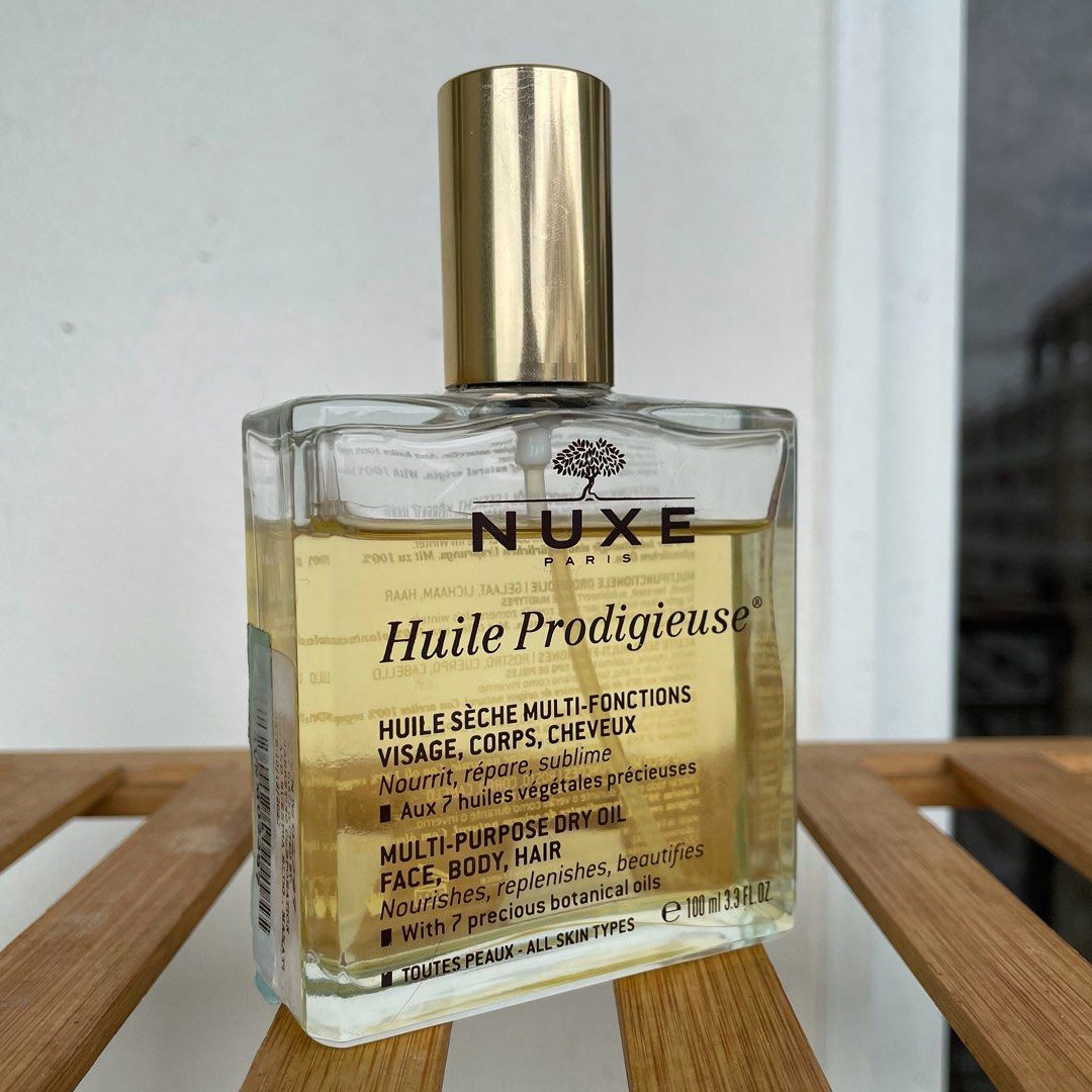 Nuxe Huile Prodigieuse Multi-Purpose Dry Oil 100ml (Category: Body Care) located in Quezon City. Submitted by curatedjunk (Listing ID 1305178552, Image 1). Description: Nuxe Huile Prodigieuse Multi-Purpose Dry Oil 100mL ₱1,500 Around 85% left RFS: changing body oil MOP: BPI, UnionBank, GCash, SeaBank Shipping c/o buyer.