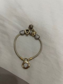 Pandora Gold bracelet with Charms