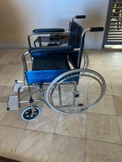 Almost new wheel chair purchased from Mercury Drug Store