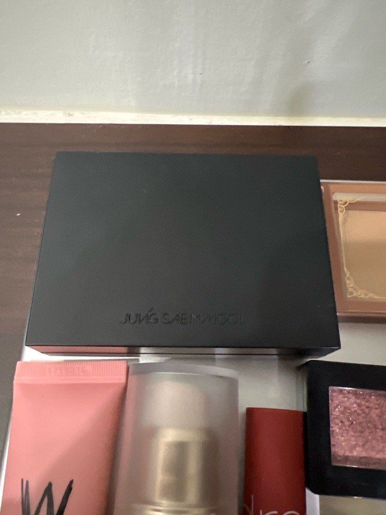 Assorted make up (Category: Makeup) located in Johor Bahru. Submitted by fionmsia (Listing ID 1305482154, Image 2). Description: All preloved 100% authentic Selling cheap because not suitable All are gifts from friends 1. Jung saem mool Essential star-cealer foundation medium RM100- used once but not my skin color🫠 2. Memebox afternoon tea contour RM40 used once but not suitable for my skin color 3. Benefit Dandelion twinkle RM140 used twice but