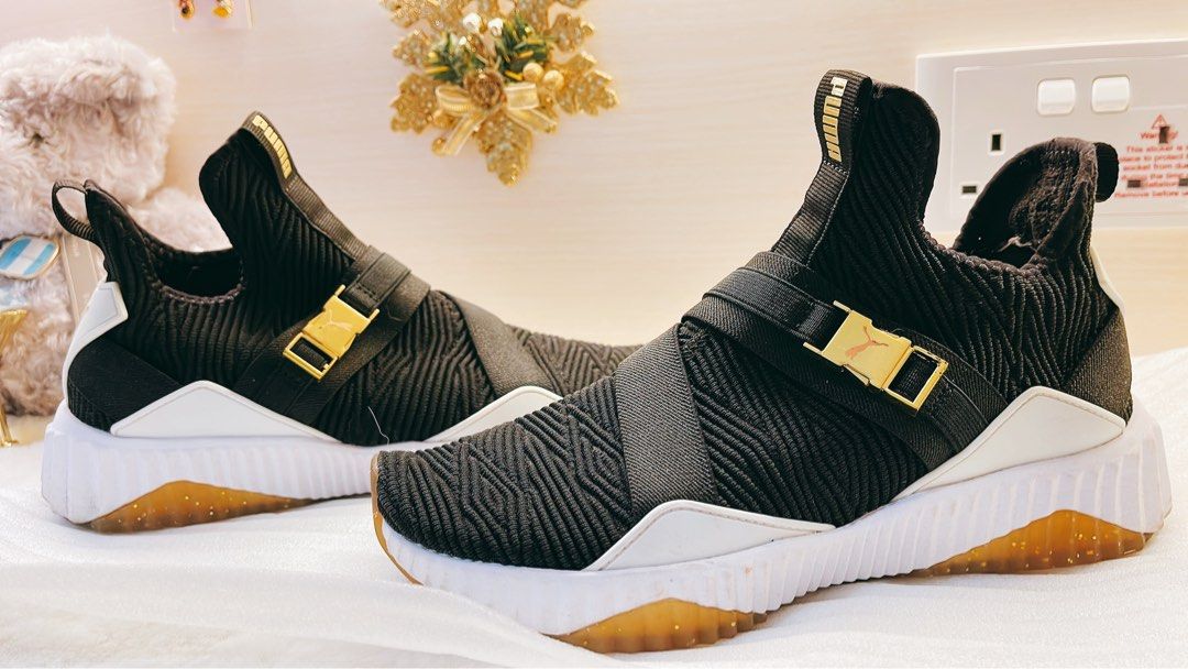 Authentic Puma Defy mid versity Black metallic Gold Women s Fashion Footwear Sneakers on Carousell