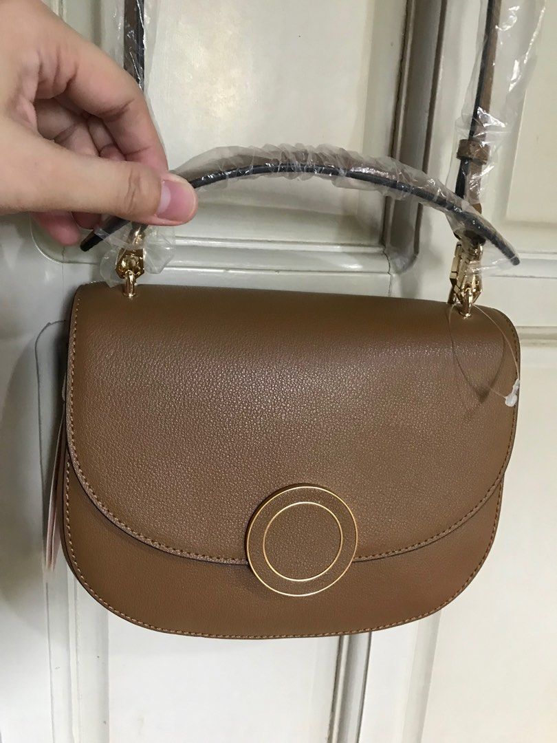 Brand new Oryany Elfna Bag (Category: Luxury Bags & Wallets) located in Santa Rosa. Submitted by rina.rina3 (Listing ID 1305358559, Image 1). Description: Brand new Oryany Elfna brown bag Super nice and sturdy From Korea You may ask for additional photos Slightly negotiable Buyer to shoulder shipping Thanks for visiting my shop ☺️.
