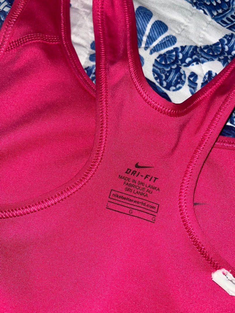 Fuchsia Nike Sports Bra (Category: Activewear) located in Quezon City. Submitted by reepurr (Listing ID 1305355206, Image 3). Description: Size Large Slight fading on Logo Original Nike No pads included .
