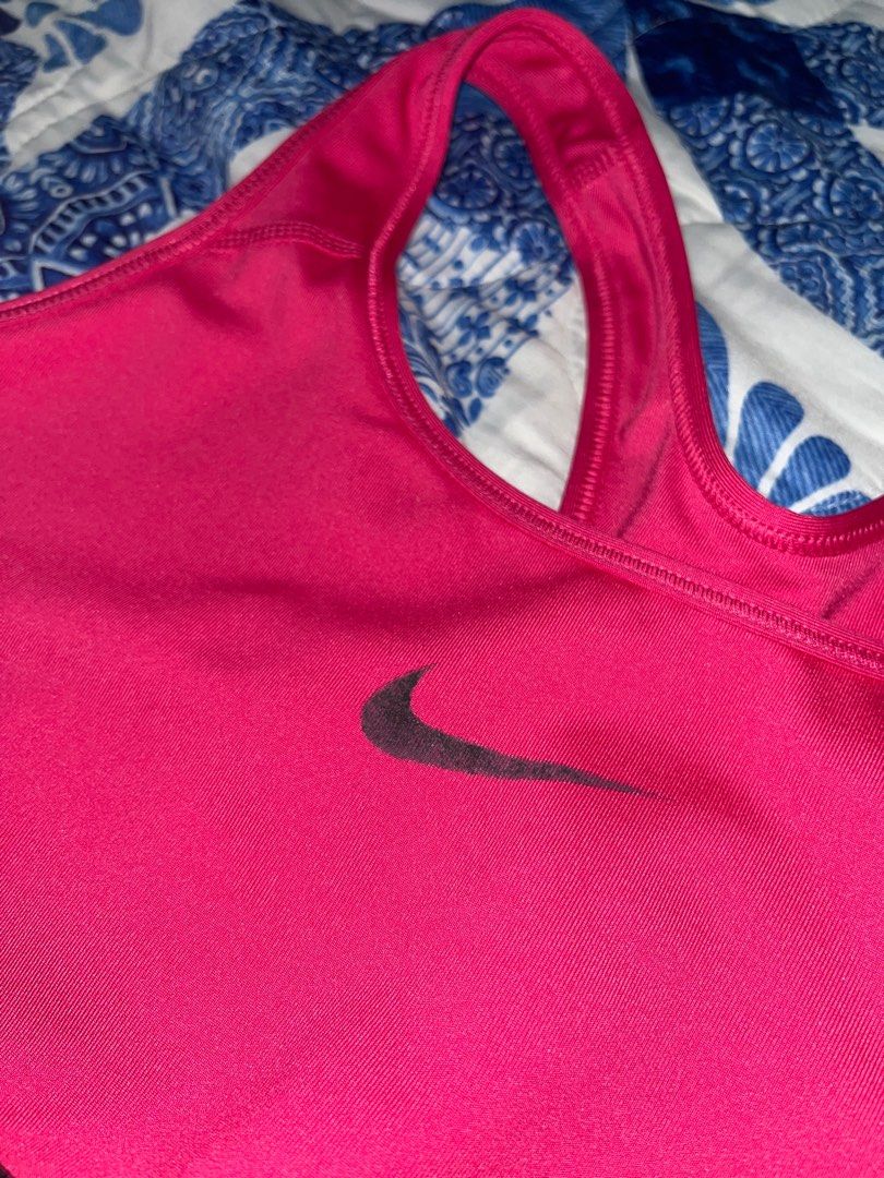 Fuchsia Nike Sports Bra (Category: Activewear) located in Quezon City. Submitted by reepurr (Listing ID 1305355206, Image 2). Description: Size Large Slight fading on Logo Original Nike No pads included .