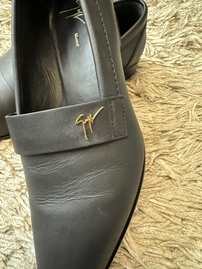 Giuseppe Zanotti Leather Shoes (Category: Dress Shoes) located in Pasig City. Submitted by ChaGee (Listing ID 1305316234, Image 3). Description: WORN ONCE FOR A WEDDING Brand: Giuseppe Zanotti Includes: Original dust bag and Box Exterior Material: Leather Lining Material: Leather Insole Material: Leather Sole Material: Leather Hardware: Gold Tone Origin: Italy Outsole length: 32 cm Outsole width: 10.5cm Closure Type: Slip On Size: 44 Bought for ₱