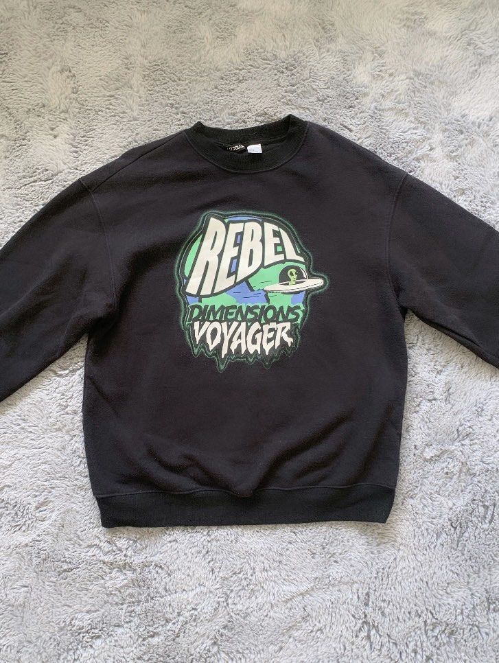 Graphic pullover (Category: Other Tops) located in Singapore. Submitted by bubblesslia (Listing ID 1305353045, Image 1). Description: An oversize fitting sweater.