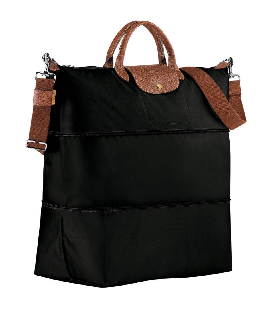 Longchamp Le Pliage Expandable Travel Bag (Category: Luxury Bags & Wallets) located in Paranaque City. Submitted by mscath.varietyshop (Listing ID 1305472178, Image 2). Description: Longchamp Le Pliage Expandable Travel Bag good as new used only a few times 2 available colors: red & black comes with long strap no box or dustbag. as is. RFS: decluttering mop: gcash/Maya mod: any preferred courier location: Parañaque last photo for price reference.