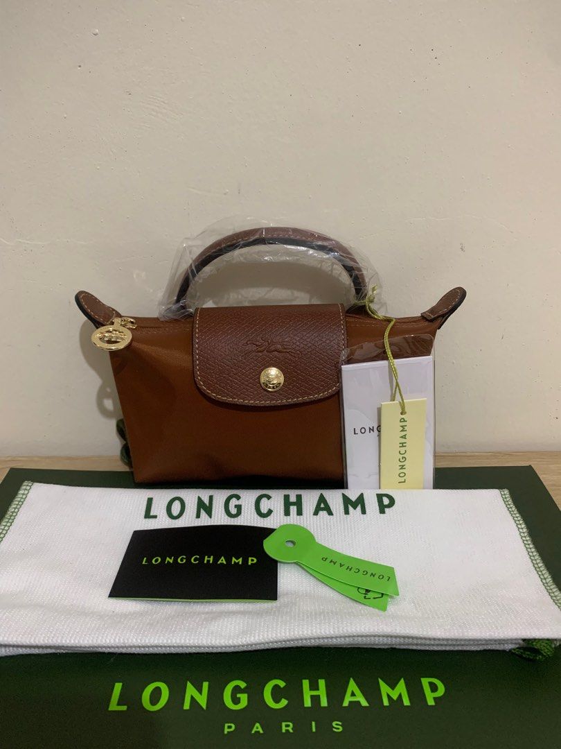Longchamp mini authentic with strap (Category: Luxury Bags & Wallets) located in Cabuyao City. Submitted by luxbymishy (Listing ID 1305474114, Image 1). Description: 3500 no sling 4500 with sling.