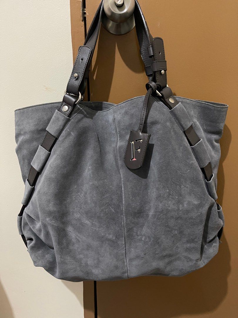 Original Furla genuine leather shoulder bag (Category: Luxury Bags & Wallets) located in Cebu City. Submitted by timeninja (Listing ID 1305481858, Image 1). Description: Gray Suede Leather in very good condition..