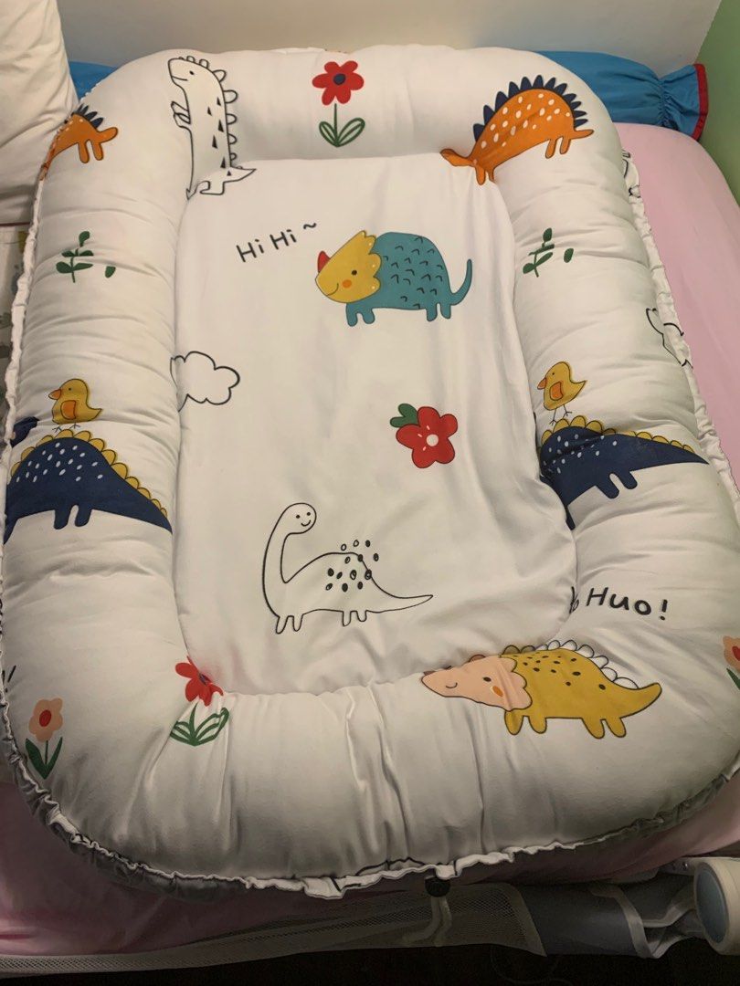 Portable baby nest/ bed (Category: Cots & Cribs) located in Calamba. Submitted by vic_wardrobetc (Listing ID 1305330107, Image 2). Description: Used only for 3months.. no pillows included.
