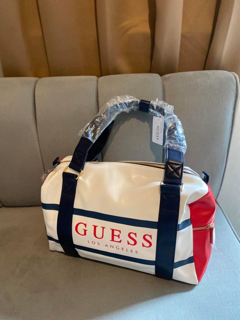 Travel bag (Category: Luxury Bags & Wallets) located in Valenzuela. Submitted by smjhsmnlzcn (Listing ID 1305326599, Image 3). Description: Best SELLER! Guess travel bag with sling strap Limited stocks only. Available 2 colors Onhand ready to ship/deliver.