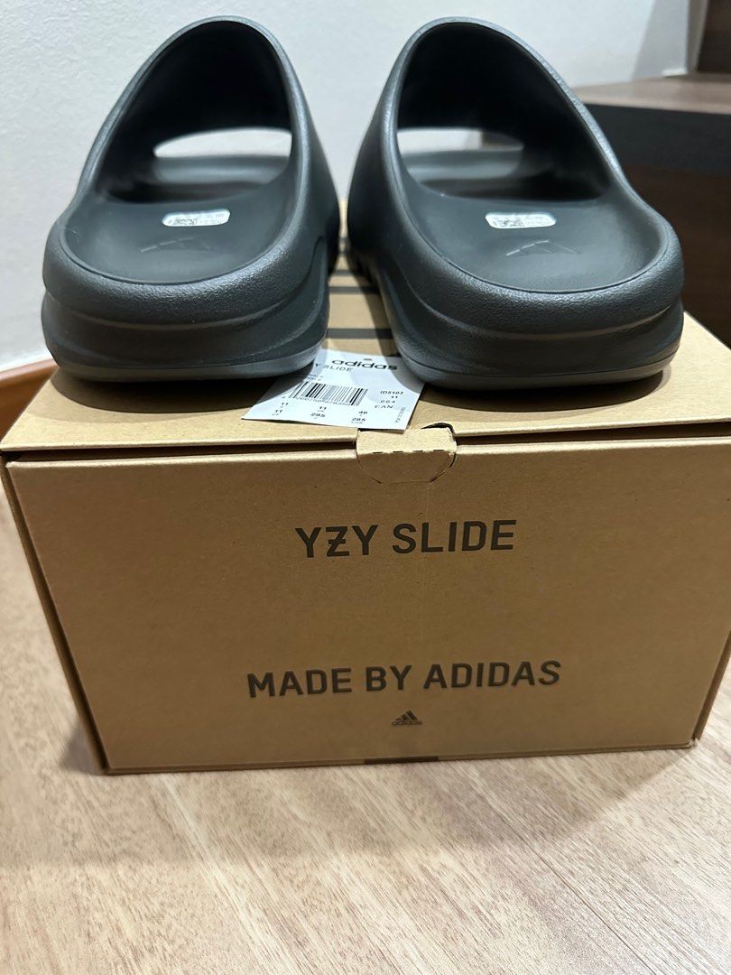 Yeezy Slides Dark Onyx US/UK11, Men's Fashion, Footwear, Flipflops and  Slides on Carousell