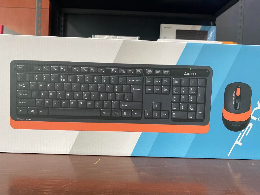 A4Tech FG1010 Fstyler Wireless Mouse Keyboard Combo Orange (Category: Computer Keyboard) located in Pasig City. Submitted by technofuseofficial (Listing ID 1305567805, Image 3). Description: A4Tech FG1010 Fstyler Wireless Mouse Keyboard Combo Orange SPECIFICATIONS Model: FG1010 Color: Orange Type: Wireless Connection: 2.4G Hz Operating Range: 10 - 15 m Mouse: FG10 Ergonomic Design: Symmetric Sensor: Optical Resolution: 1200/1600/2000 DPI Report R