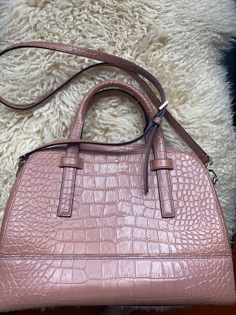 Authentic Kate Spade (Category: Luxury Bags & Wallets) located in Mandaluyong City. Submitted by loved_curated (Listing ID 1305514236, Image 1). Description: Easy to maintain Kate Spade pink leather croc bag. It has a cross body strap as well. No issues. Comes with card and pouch. .