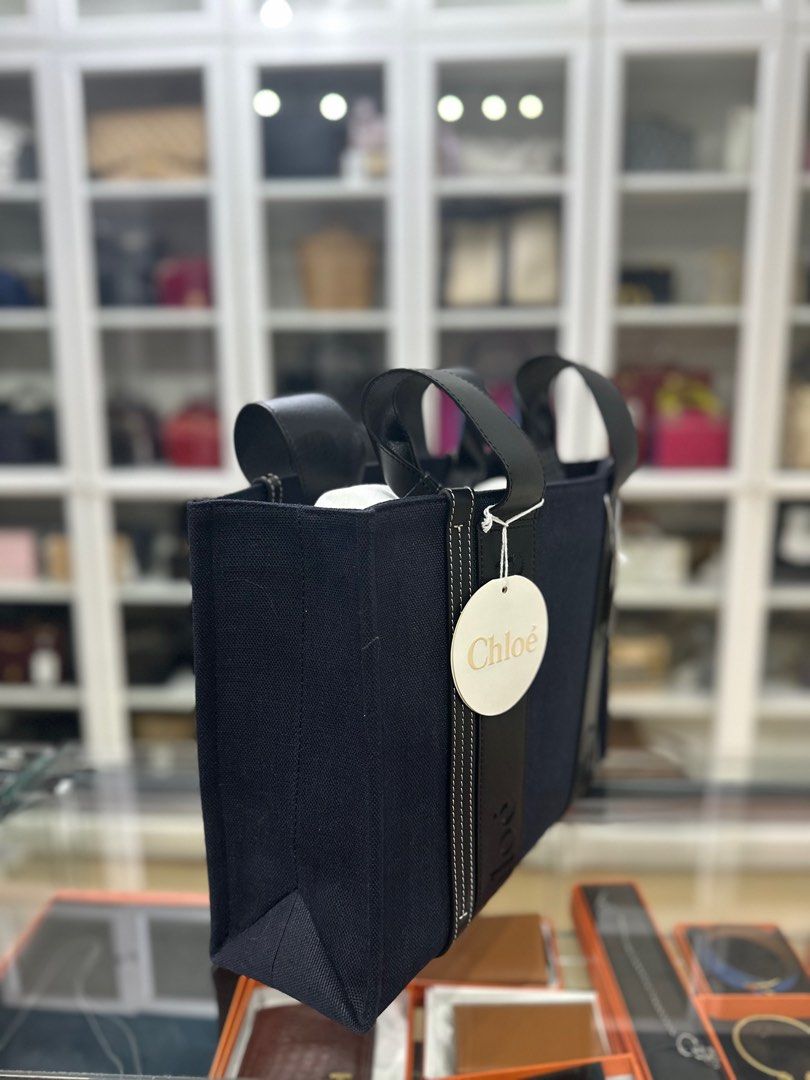 Chloe Woody Canvas Medium Tote Bag (Deep Denim) (Category: Luxury Bags & Wallets) located in Taguig. Submitted by closetcompany (Listing ID 1305539751, Image 2). Description: Chloe Woody Canvas Medium Tote Bag (Deep Denim) 🫧Php 53,000 🫧CONDITION: Unused, good as new 🫧RATING: 10/10 🫧INCLUSIONS: dust bag, care booklet, tag, and Entrupy certificate of authenticity 🫧Modes of Payment: Cash BDO credit card (Up to 12 mos installment with interest) 