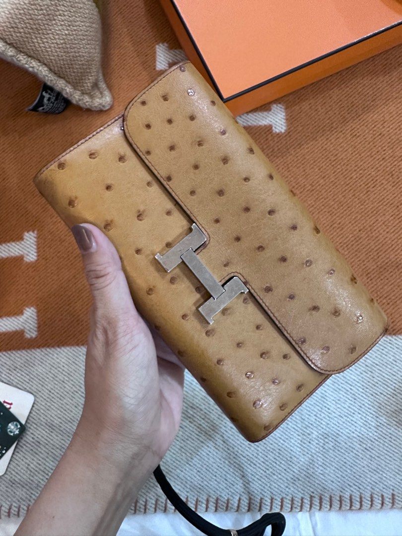 Hermes Constance wallet (Category: Luxury Bags & Wallets) located in Manila. Submitted by rouge_and_orange (Listing ID 1305496316, Image 3). Description: Authentic Ostrich Hermes Constance wallet Gold color Silver hardware With box Strap not included .