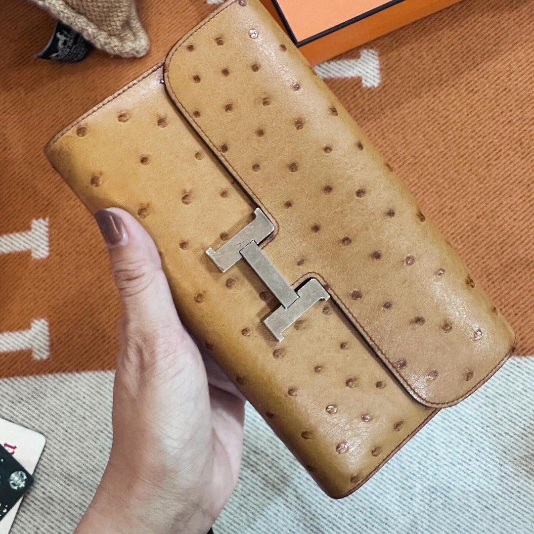 Hermes Constance wallet (Category: Luxury Bags & Wallets) located in Manila. Submitted by rouge_and_orange (Listing ID 1305496316, Image 1). Description: Authentic Ostrich Hermes Constance wallet Gold color Silver hardware With box Strap not included .