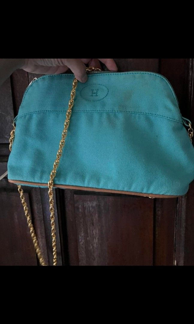 HERMES Pouch (Category: Luxury Bags & Wallets) located in Quezon City. Submitted by uptrendglam (Listing ID 1305606247, Image 1). Description: Hermes pouch, ive provided it with a gold sling to create the slingbag look. Small in size, but can fit your phone. Guaranteed authentic. Made in France and 100% cotton. Never worn. Issue : needs wash.