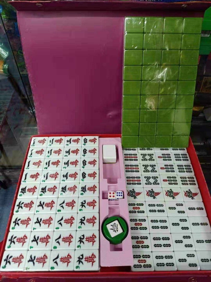 Mahjong set (Price Varies on sizes available) (Category: Board Games & Puzzles) located in Manila. Submitted by julieggggg (Listing ID 1305532007, Image 2). Description: 144 tiles in one set with 2 extra blank tiles with 2 dice and one marker color available: ivory, blue, green or pink Mahjong set price list: Travelling size 1250 pesos Señorita 1350 pesos Standard/ Regular size 35mm 1400 pesos Jumbo 36mm1800 pesos Super Jumbo 38mm 2300 pesos Xtra