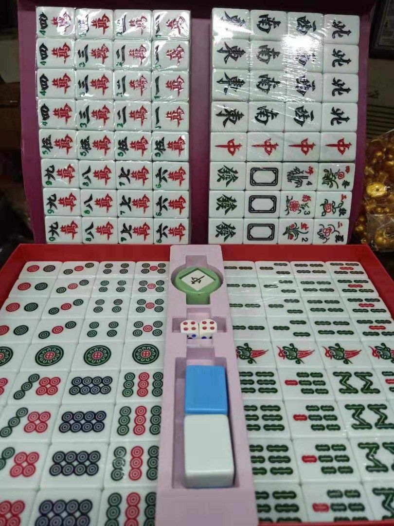 Mahjong set (Price Varies on sizes available) (Category: Board Games & Puzzles) located in Manila. Submitted by julieggggg (Listing ID 1305532007, Image 3). Description: 144 tiles in one set with 2 extra blank tiles with 2 dice and one marker color available: ivory, blue, green or pink Mahjong set price list: Travelling size 1250 pesos Señorita 1350 pesos Standard/ Regular size 35mm 1400 pesos Jumbo 36mm1800 pesos Super Jumbo 38mm 2300 pesos Xtra
