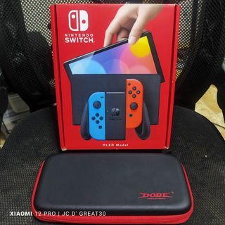 Nintendo Switch Oled Neon good as new Complete