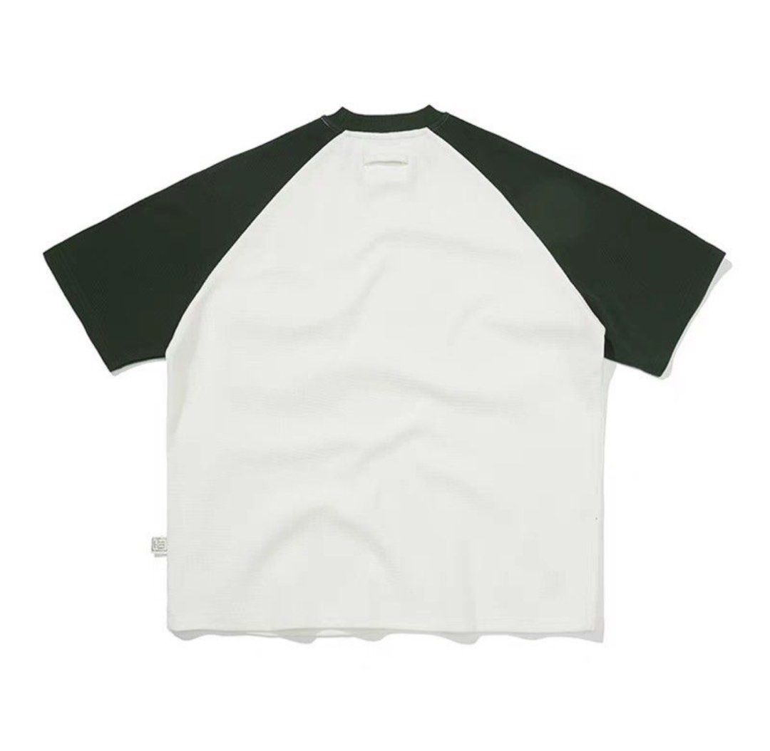 Oversize patchwork waffle tee (Category: Tshirts & Polo Shirts) located in Singapore. Submitted by rearm (Listing ID 1305560270, Image 2). Description: Detailed patchwork oversize waffle tee White and Olive green Brand new Selling cheap.