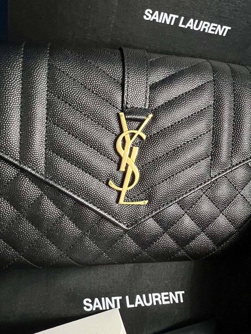 YSL CLUTCH AUTHENTIC BAG (Category: Luxury Bags & Wallets) located in Bacolod City. Submitted by luxepapi (Listing ID 1305599885, Image 2). Description: Retails for ₱50,000 -bought from YSL singapore store/receipt included -complete with box/dustbag/care booklets/receipt.