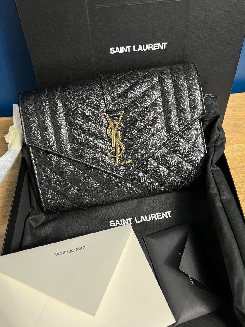 YSL CLUTCH AUTHENTIC BAG (Category: Luxury Bags & Wallets) located in Bacolod City. Submitted by luxepapi (Listing ID 1305599885, Image 1). Description: Retails for ₱50,000 -bought from YSL singapore store/receipt included -complete with box/dustbag/care booklets/receipt.