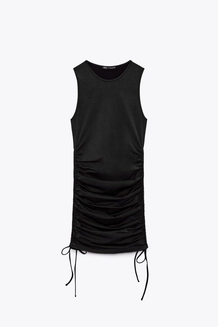 Zara Rutched Black Dress (Category: Dresses) located in Marikina City. Submitted by elle.desmar (Listing ID 1305528289, Image 1). Description: Zara!! Sobrang ganda di lang kasya sakin huhuhu Bought from Japan Zara M-L size. For petite lang to. No when worn kasi di ako petite.