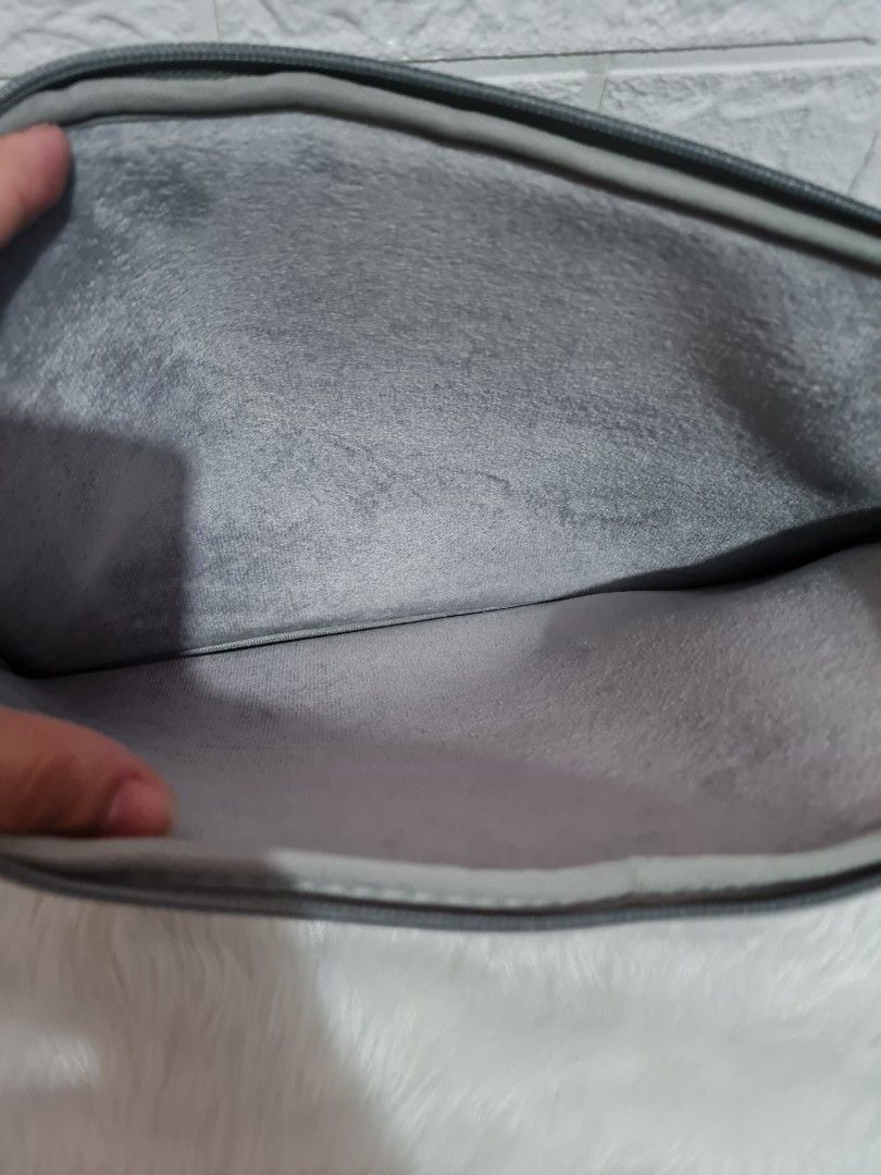 Zippered laptop case (fits 13" laptop) (Category: Laptop Bags & Sleeves) located in Cavite. Submitted by iammil (Listing ID 1305574338, Image 3). Description: Bought at the SM Store for Php 349. No flaw, as good as new. RFS: changed to laptop sleeve.