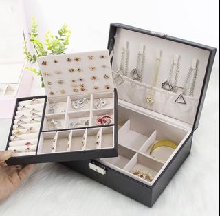 Black jewelry box with lots of compartments