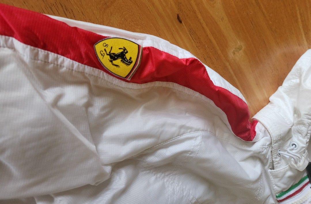 Classic Puma x Ferrari hooded rain jacket (Category: Activewear) located in Antipolo. Submitted by saslbs (Listing ID 1305803096, Image 3). Description: ❤️Classic and Rare Puma x Ferrari hooded rain jacket in good condition. Hood is removable. Perfect for collectors. 6k Payment thru g-cash. Delivery thru Lbc or lalamove care of buyer..