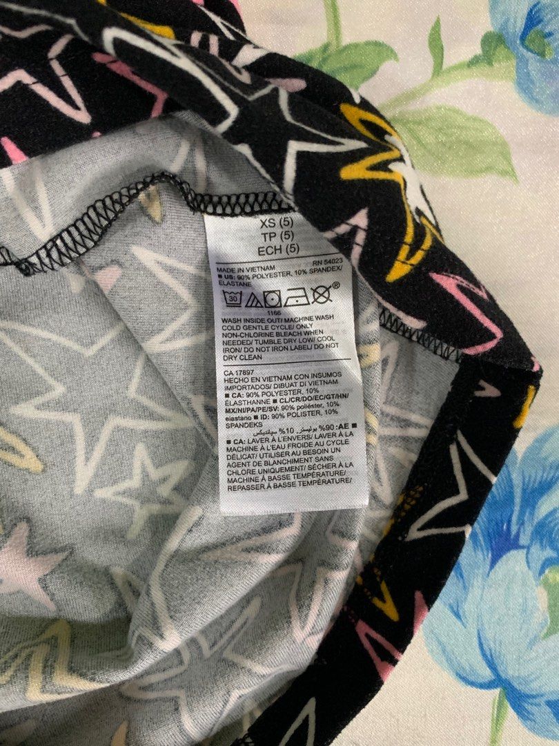 authentic Old Navy rockstar dress with pockets (Category: Babies & Kids Fashion) located in Cagayan de Oro. Submitted by tiptop.things (Listing ID 1305812740, Image 3). Description: Size on tag: XS (5T) Authentic/original (bought from the US) Dress is made of soft, comfortable fabric with rockstar print. Comes with pockets on the skirt. Used and washed once; still in great condition (Please manage expectations for preloved items) May give discoun