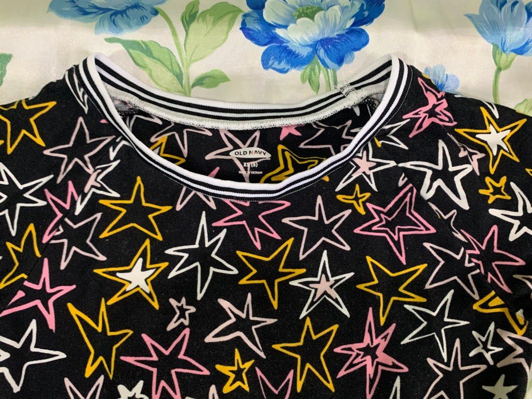 authentic Old Navy rockstar dress with pockets (Category: Babies & Kids Fashion) located in Cagayan de Oro. Submitted by tiptop.things (Listing ID 1305812740, Image 2). Description: Size on tag: XS (5T) Authentic/original (bought from the US) Dress is made of soft, comfortable fabric with rockstar print. Comes with pockets on the skirt. Used and washed once; still in great condition (Please manage expectations for preloved items) May give discoun