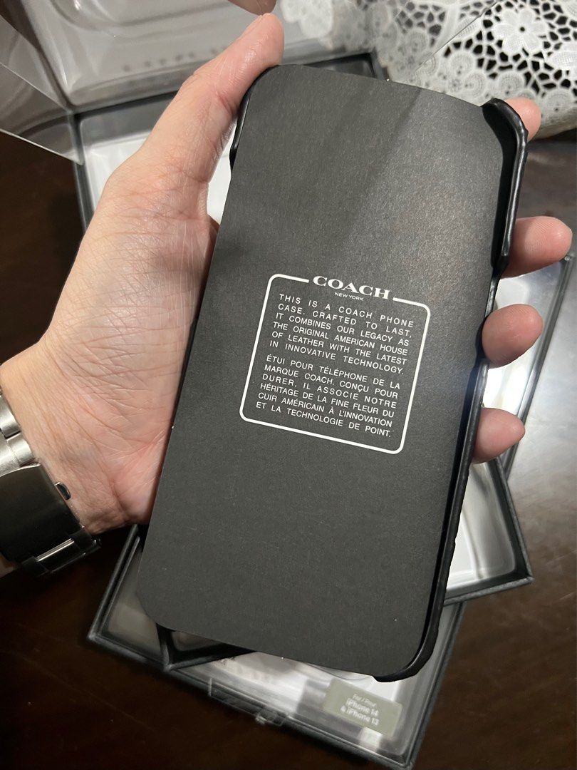 Original Coach Leather Case for iPhone 13 / 14 (Category: Cases & Sleeves) located in Manila. Submitted by razelysonn (Listing ID 1305768965, Image 3). Description: Brand new and 2pcs only, limited stock! :).