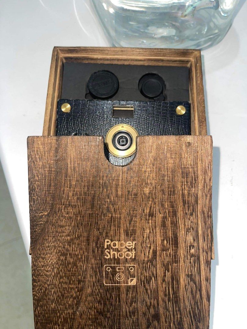 Paper shoot Camera in Black Leather (Category: Cameras) located in Valenzuela. Submitted by cinnamorolledt (Listing ID 1305779955, Image 3). Description: [18MP- Ink Black Leather] Hi! Selling my papershoot camera 📷 RFS: Hindi na po nagagamit ☹️ Complete Inclusions🖤 Pre-loved item! Inside the packaging includes: 1 box 1 camera board 1 case 1 washable paper strap 2 lenses 2 plastic fasteners 2 brass fasteners. 2 batteries *Actual images of inclus