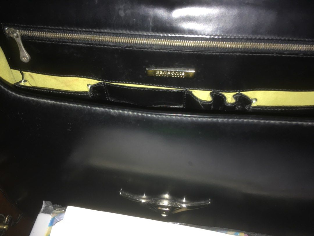 Samsonite briefcase (Category: Briefcases) located in Makati City. Submitted by unloadealr (Listing ID 1243556412, Image 2). Description: very smooth shiny finish with minimal leather creases, small dents, spot leather and metalware discoloration length 37 cm width 28 cm depth 6-8 cm .