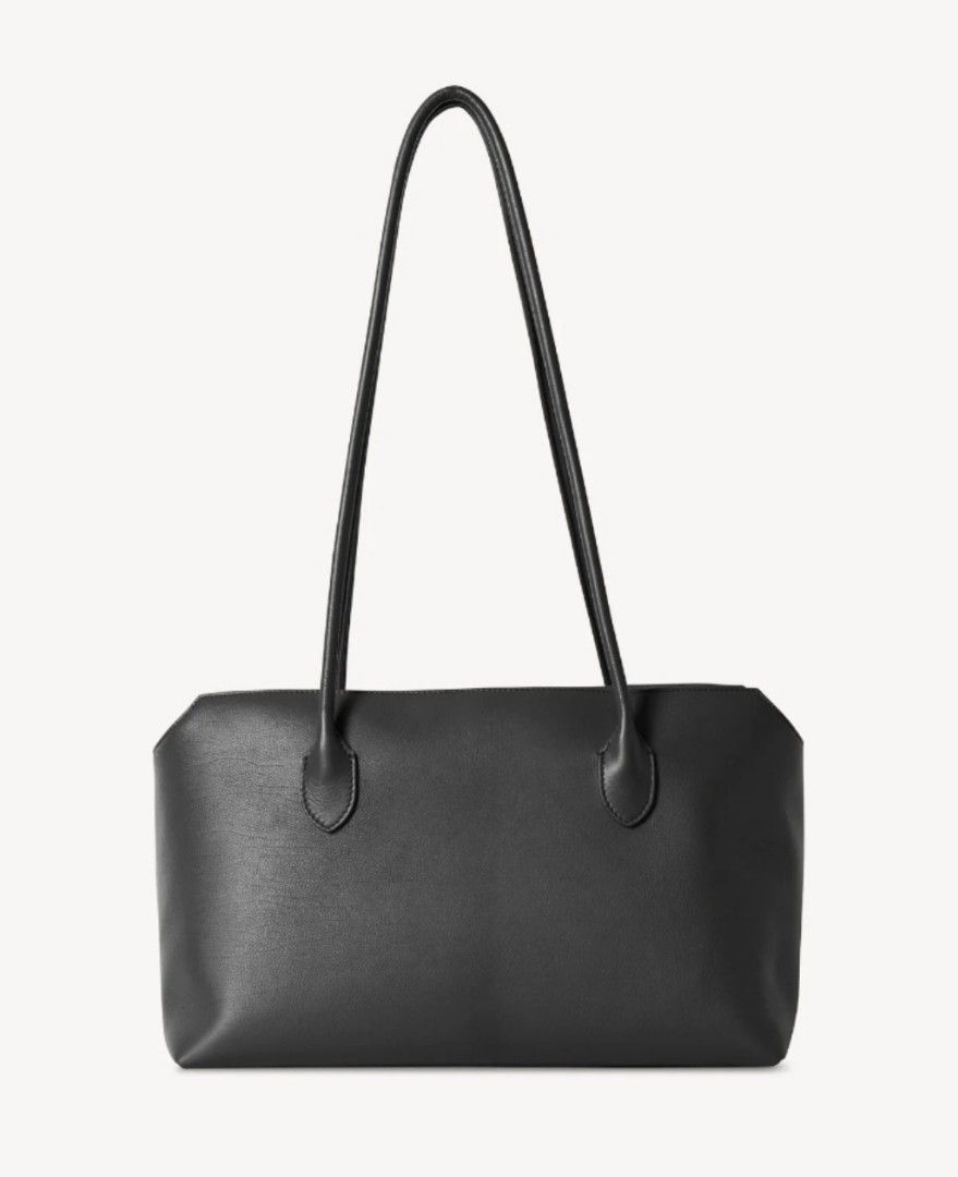 Terrasse Bag by The Row (Category: Bags & Wallets) located in Singapore. Submitted by thebeautysamplers (Listing ID 1305826305, Image 1). Description: Selling off on mom's behalf Authentic item rfs: seldom use / only used once please see last pic for actual photo of bag material: calfskin leather Bag details and measurements can be found in pics provided for more info on bag: https://www.therow.com/en-ap/products/terrasse-bag-black RTP: USD $2,99