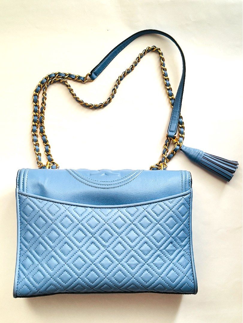 Tory Burch Blue Quilted Leather Fleming Shoulder Bag (Category: Luxury Bags & Wallets) located in Makati City. Submitted by maried05 (Listing ID 1305696055, Image 2). Description: Authentic Tory Burch bought in Manila Price bought Php 25,000 No receipt already With dustbag Lightly used, marks seen in picture Exterior Material-Leather Interior Material-Fabric Length-27 cm Width-8 cm Height-19 cm Shoulder Strap-31 cm shortest 58 Longest Hardware-Go