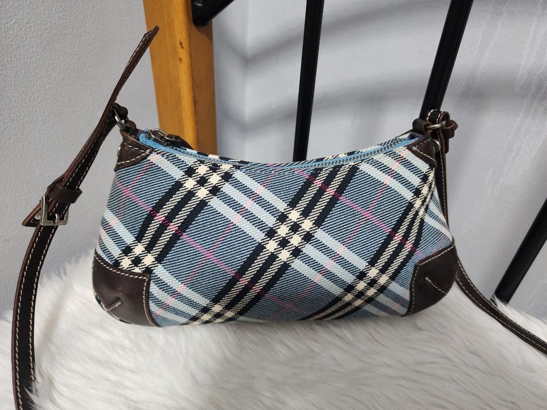 💯 Authentic Burberry Blue Checkered Sling bag (Category: Luxury Bags & Wallets) located in Paranaque City. Submitted by rizasauthenticitems (Listing ID 1305980258, Image 2). Description: Authentic Burberry Blue Checkered Sling bag Blue Label Very good condition Very Elegant.