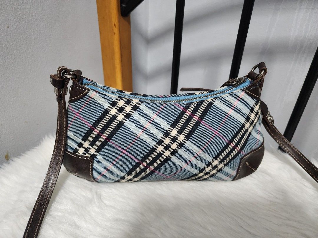💯 Authentic Burberry Blue Checkered Sling bag (Category: Luxury Bags & Wallets) located in Paranaque City. Submitted by rizasauthenticitems (Listing ID 1305980258, Image 1). Description: Authentic Burberry Blue Checkered Sling bag Blue Label Very good condition Very Elegant.